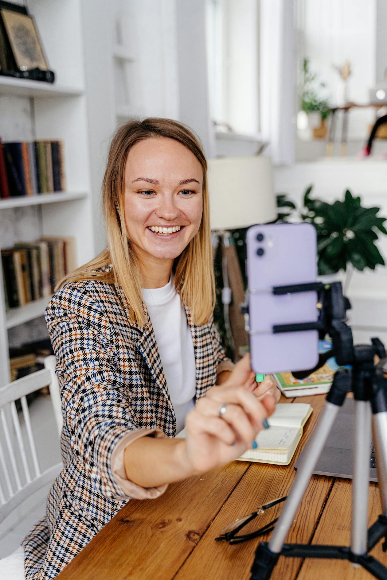 Woman talking on a video call in a home office